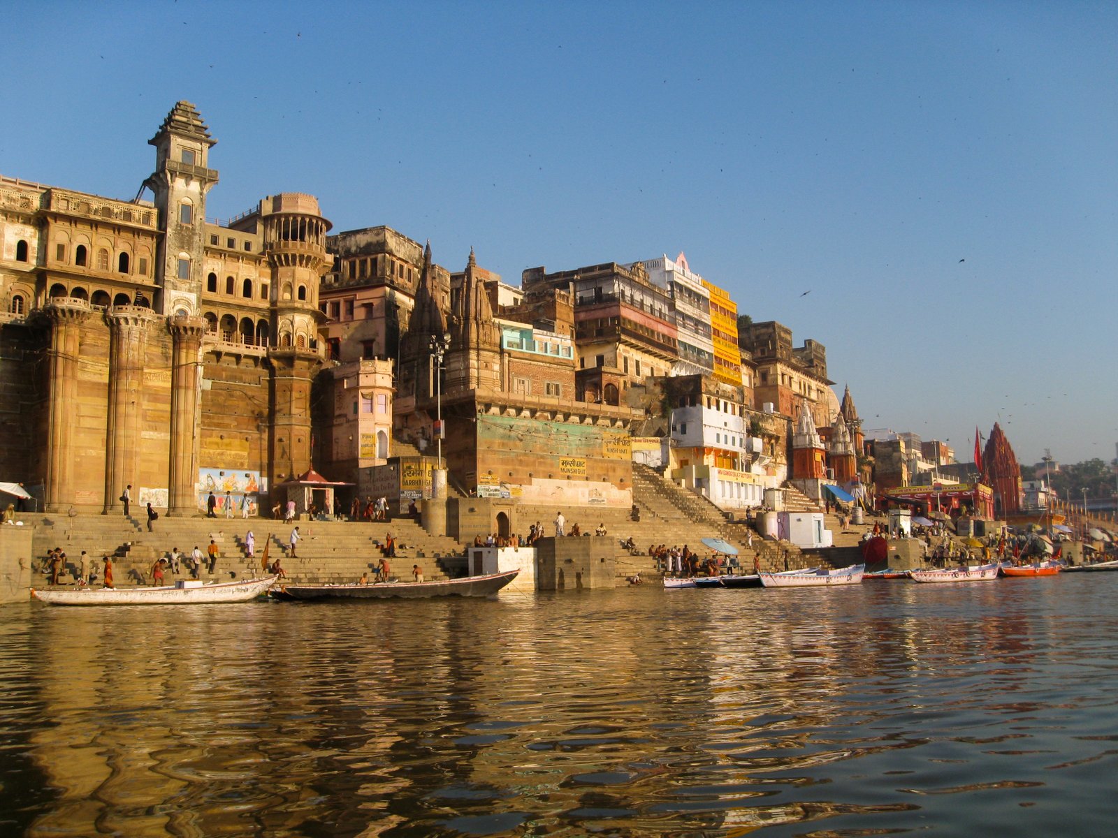 Historic riverfront buildings and ghats beside the Ganga in Varanasi